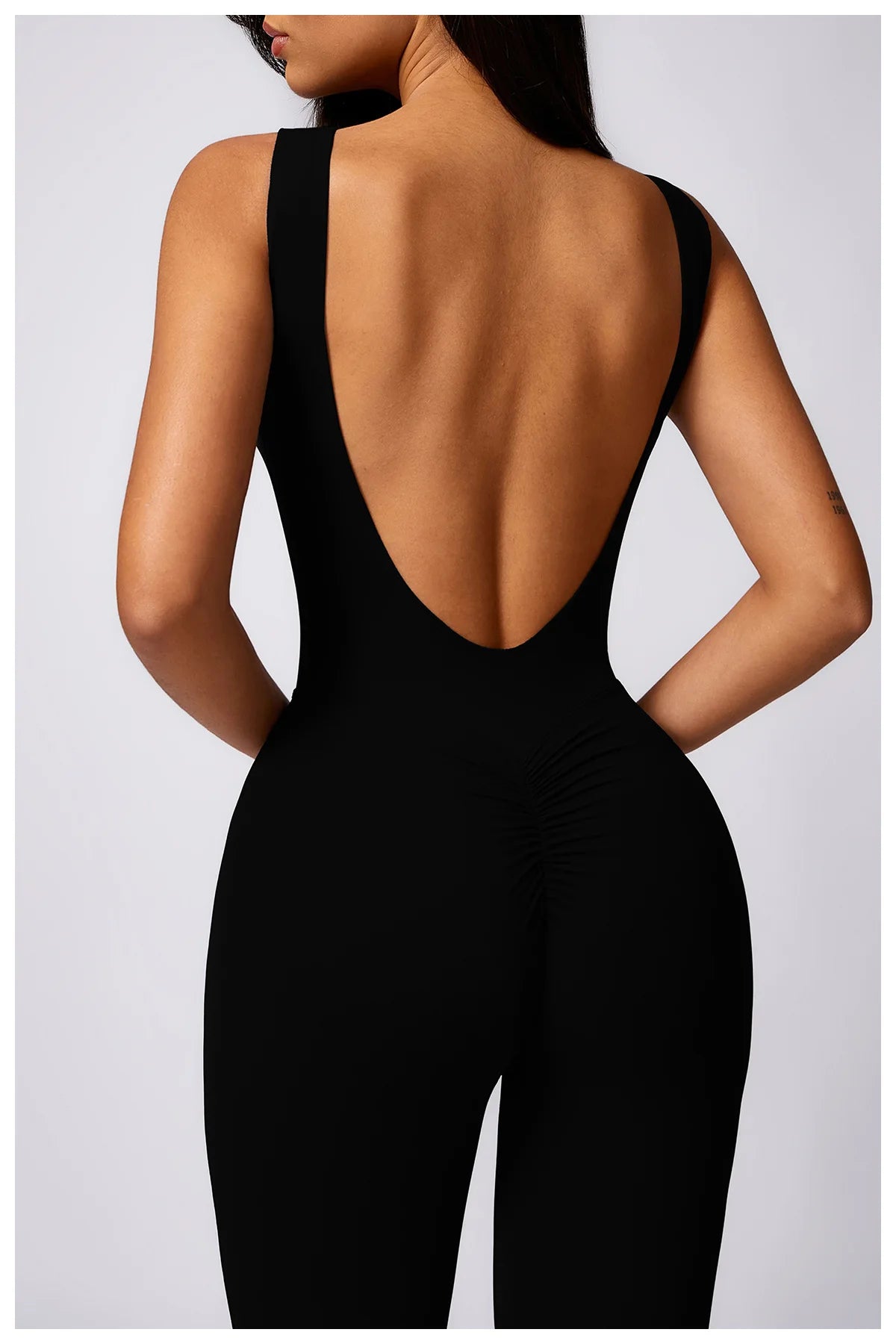 Women's SculptFit® Flare Yoga Jumpsuit – Sleeveless One-Piece Workout Romper